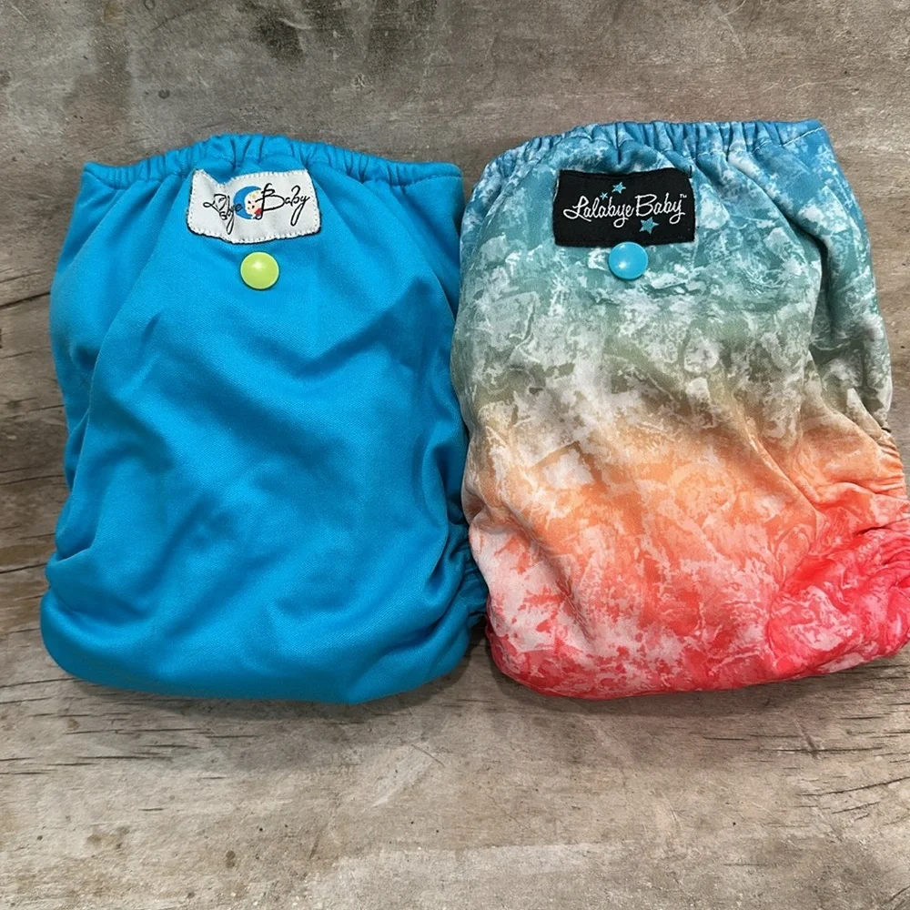 Lalabye Baby, one size cloth diapers reusable. Pair, one print one solid. *USED*